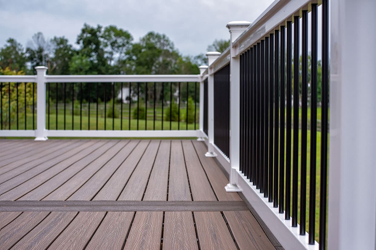 Second Floor Composite Deck With Vinyl Railings In New Providence 17