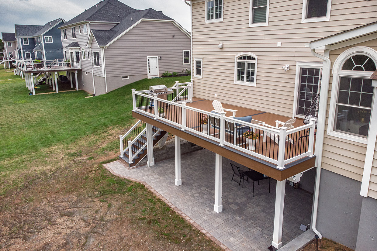 Composite Deck With Vinyl Railings And Under Deck Finishes In Summit 5
