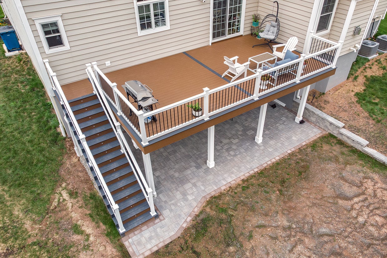 Composite Deck With Vinyl Railings And Under Deck Finishes In Summit 7
