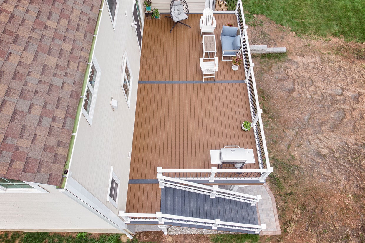 Composite Deck With Vinyl Railings And Under Deck Finishes In Summit 9