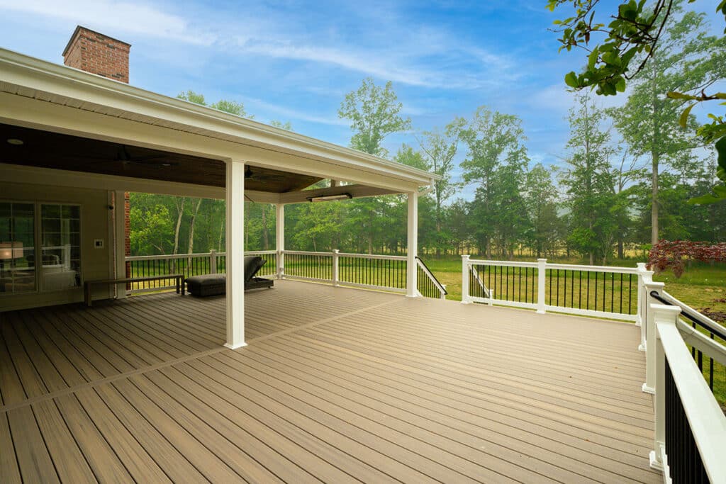 Large Composite Deck With Vinyl Railings And A-Frame Open Porch With Natural Tone Wood Ceiling