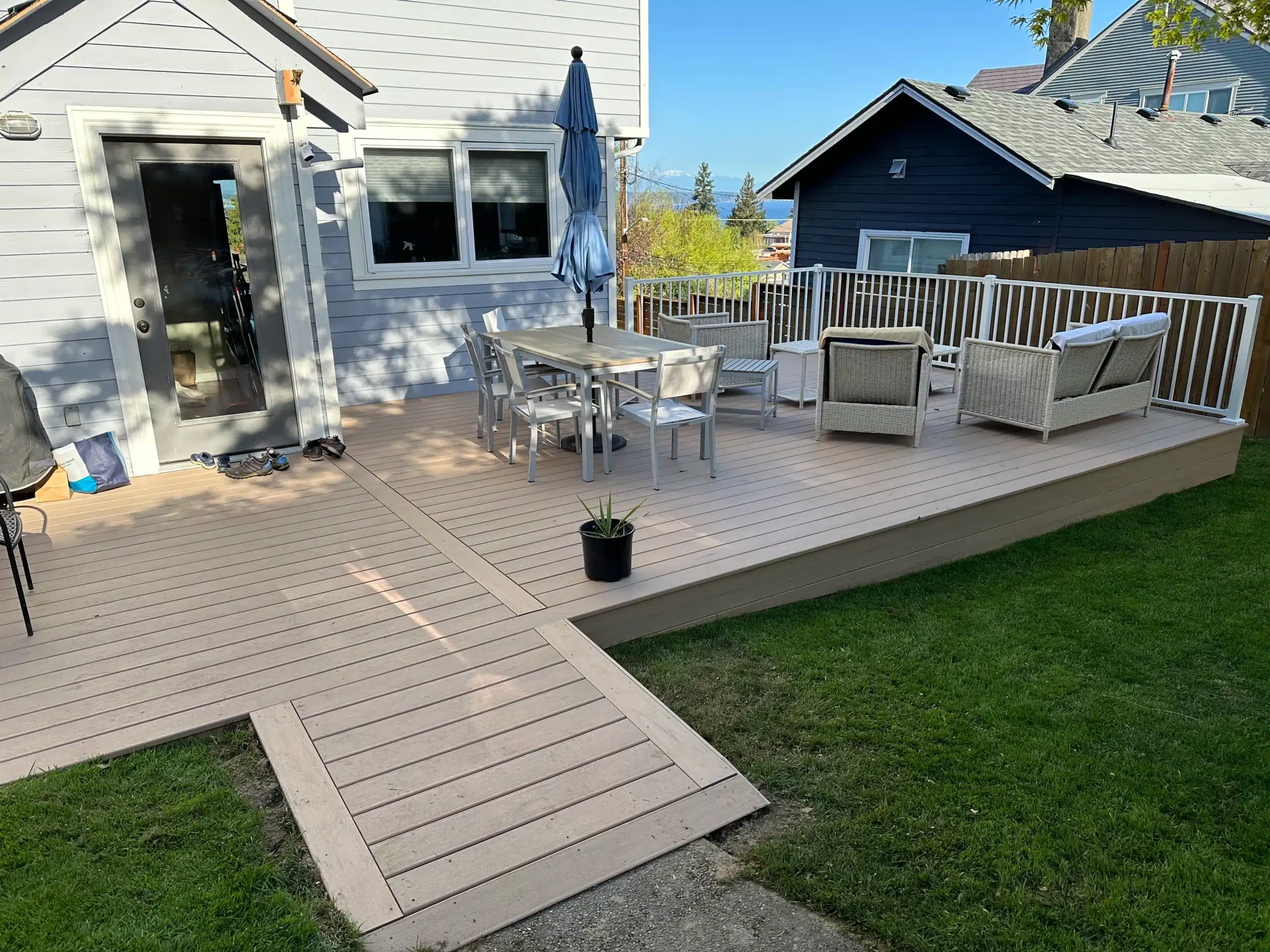 best outdoor wood stain and sealer for decks 2 A Well-Designed Deck With Contemporary Furniture, Showcasing The Best Outdoor Wood Stain And Sealer For Decks That Ensures Durability.