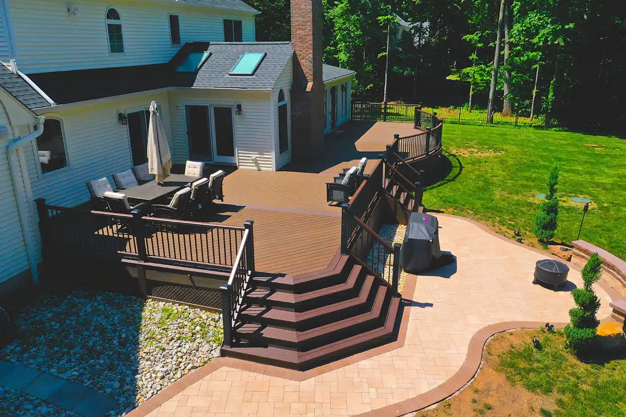 NJ Patio Installation 2 A Spacious Deck With Seating And Steps, Perfect For Nj Patio Installation.