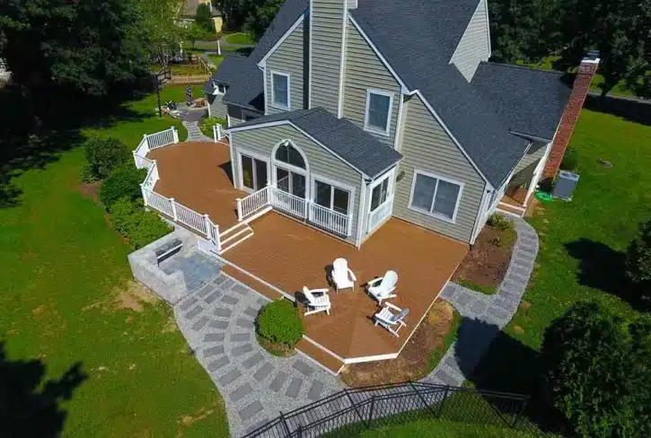NJ Patio Installation 1 A Stylish Patio And Deck Area With Seating, Perfect For Nj Patio Installation.