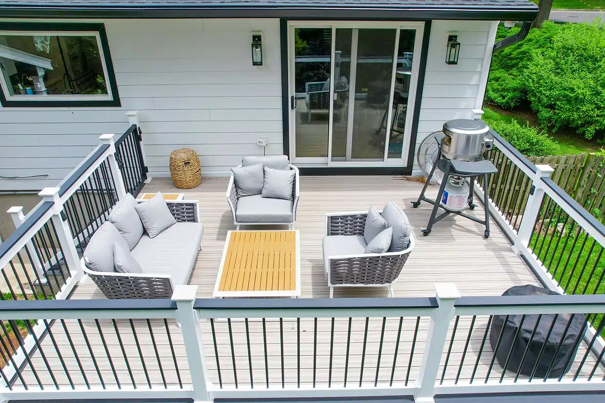 NJ Patio Installation 5 A Stylish Deck With Comfortable Seating And A Grill, Perfect For Nj Patio Installation.