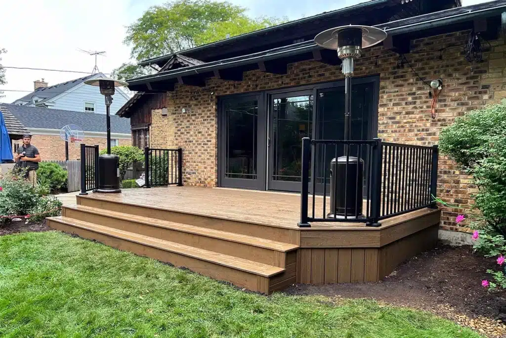 Wooden Deck With Black Railings And Heaters After Deck Resurfacing In Nj